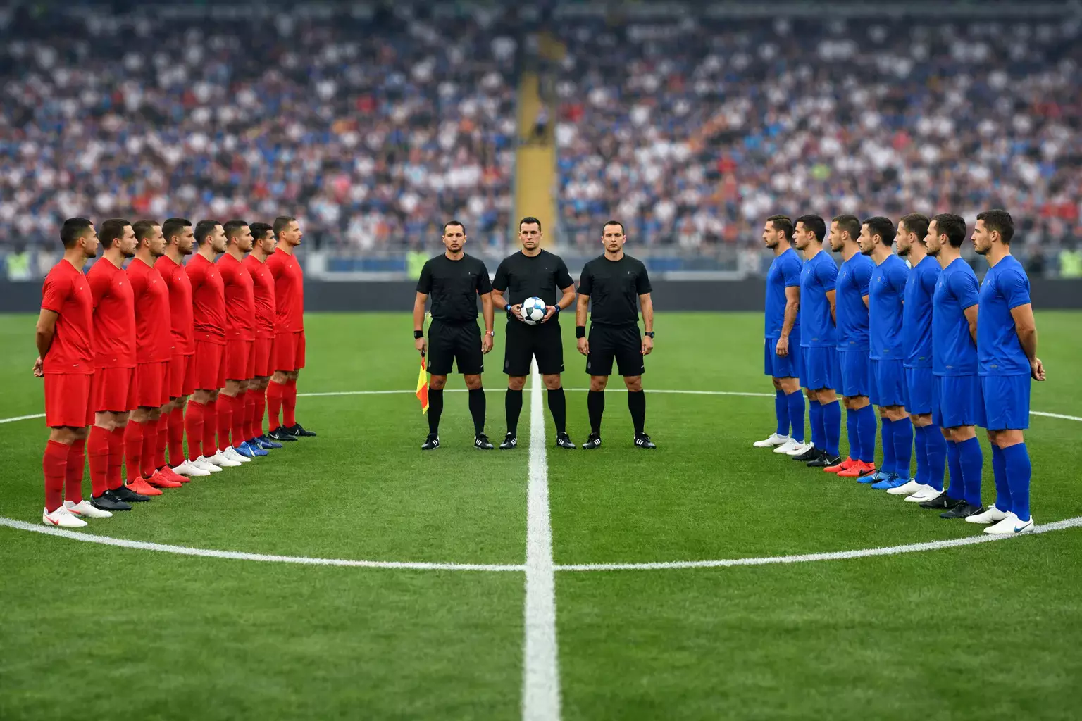 Due squadre schierate a centrocampo prima del fischio d'inizio su erba verde